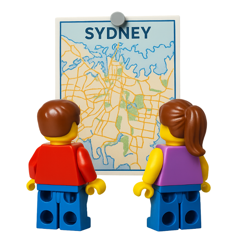 Image of two LEGO minifigures looking at a map of Sydney